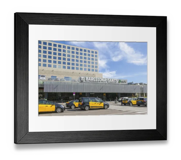 Framed Print : Taxis in street outside Barcelona-Sants railway station building in city centre