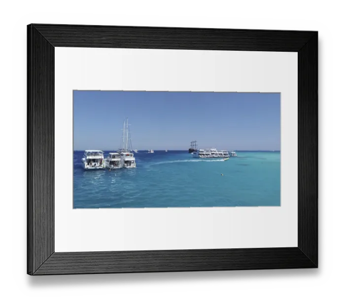 Framed Print : The snow-white yachts arrived as part of the Egyptian Maldives excursion tour