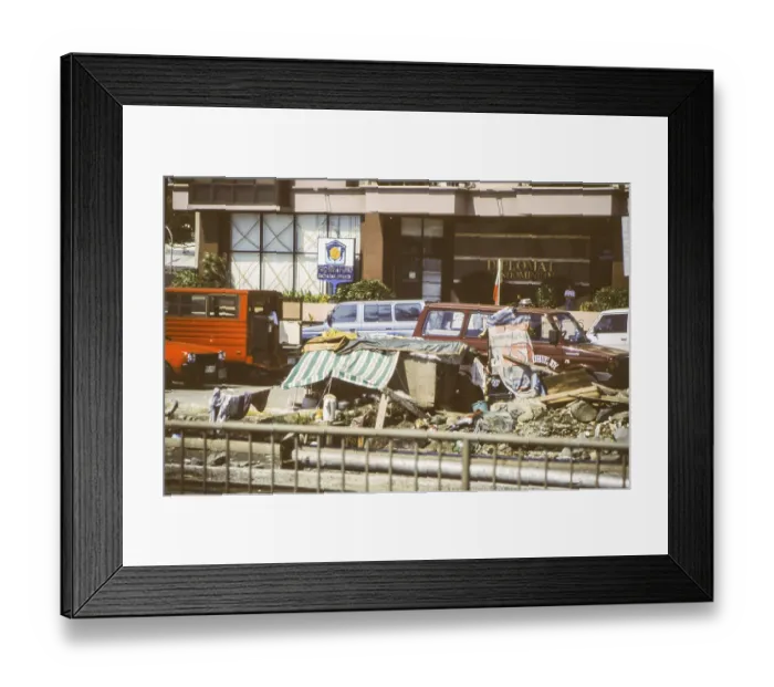 Framed Print : Homeless people have built an emergency shelter consisting of a wooden box