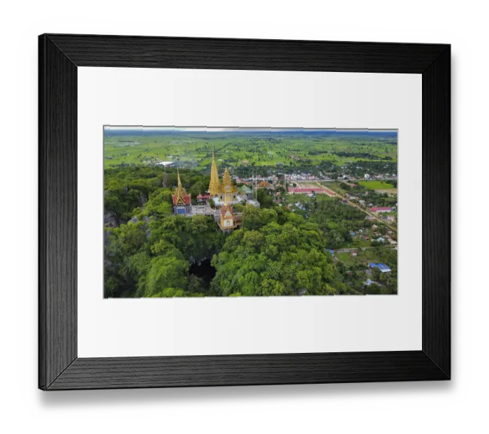 Framed Print : A buddhist temple on a mountain in Cambodia seen from above