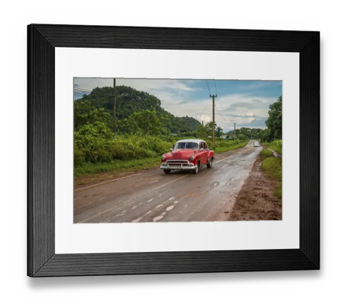 Framed Print : Red old american car drive on rural road in Cuban mountains Framed Print : Red old american car drive on rural road in Cuban mountains