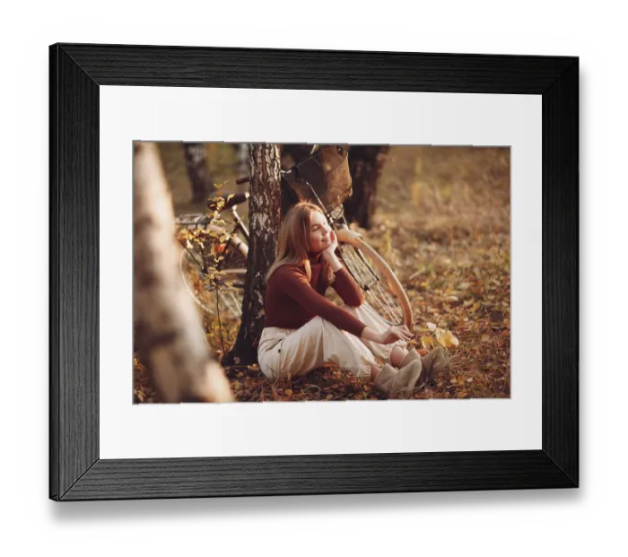 Framed Print : Happy active young woman riding vintage bicycle in autumn park at sunset