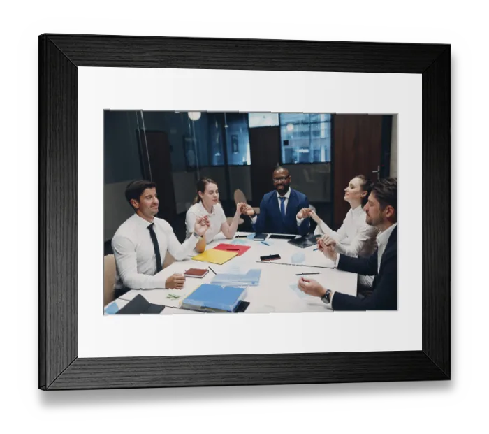 Framed Print : Businessman and businesswoman team meditate and holds hands each other after office meeting