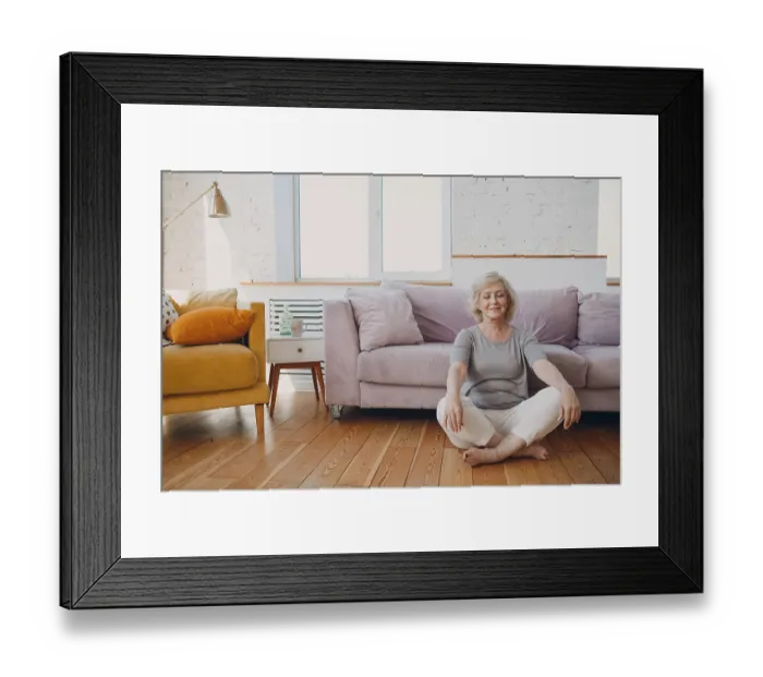 Framed Print : Senior adult smiling old granny practicing yoga at home living room