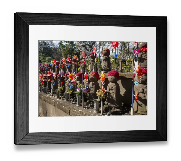 Framed Print : Jizo statues with red crocheted caps