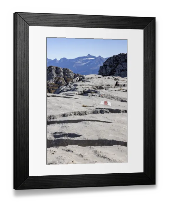 Framed Print : Hiking trail marking, trail sign on limestone