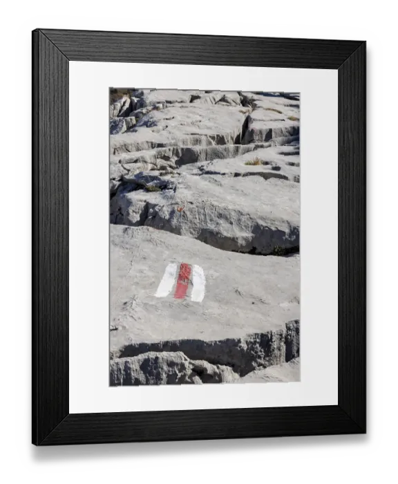 Framed Print : Hiking trail marking, trail sign on limestone