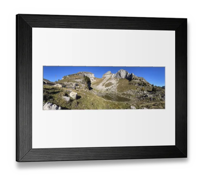 Framed Print : Cliffs at Tour de Mayen with a small mountain lake Lac de Mayen