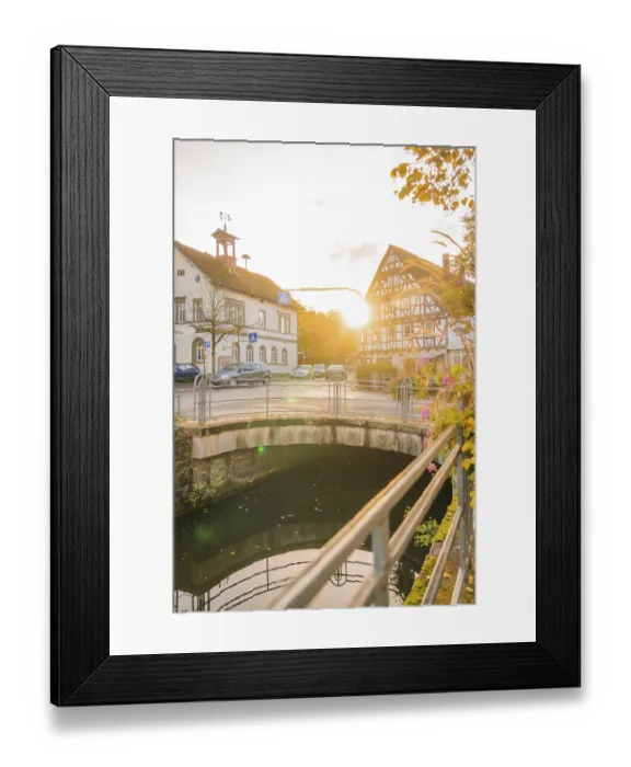 Framed Print : Bridge over a river, half-timbered buildings at sunset Framed Print : Bridge over a river, half-timbered buildings at sunset