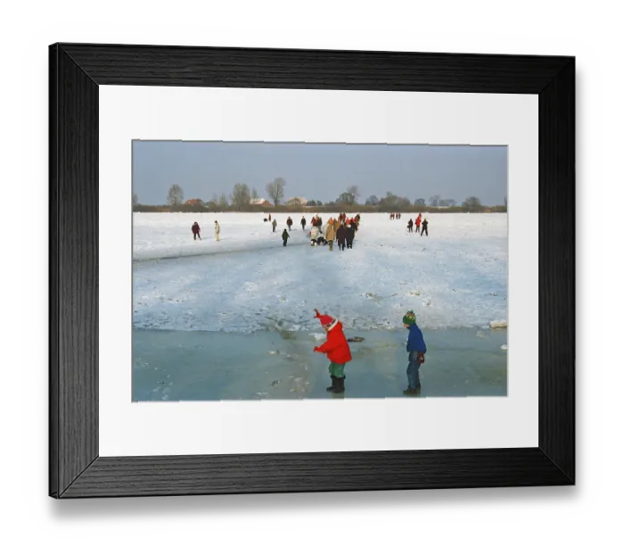 Framed Print : People walking across ice rink