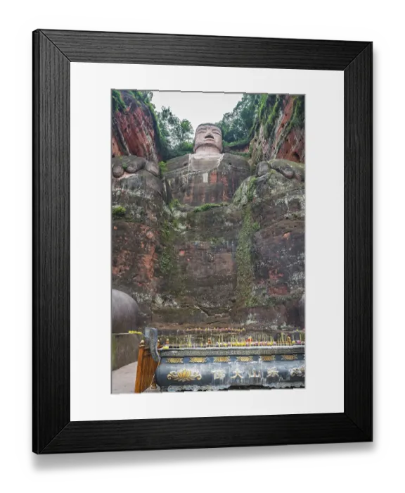 Framed Print : Leshan, China - July 2019 : Memorial candles lit at the bottom of The Giant Leshan Buddha Framed Print : Leshan, China - July 2019 : Memorial candles lit at the bottom of The Giant Leshan Buddha