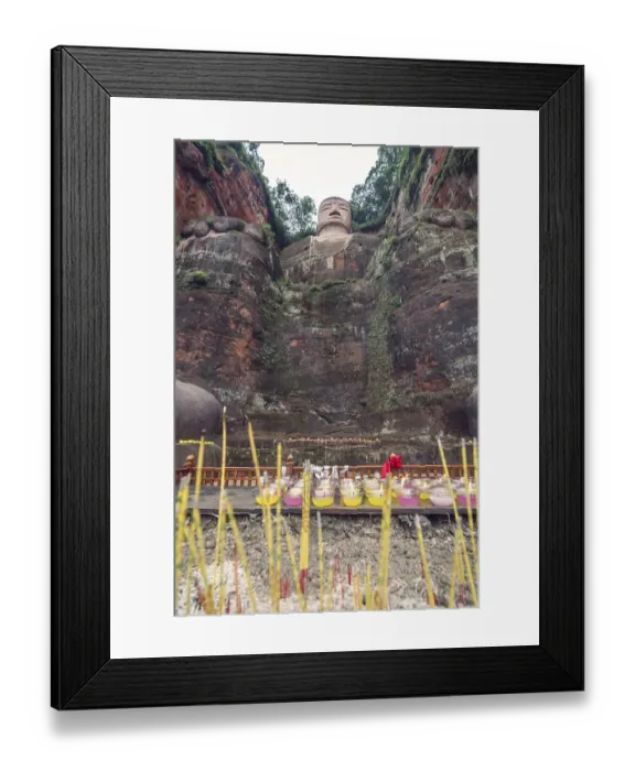 Framed Print : Memorial candles lit at the bottom of The Giant Leshan Buddha Framed Print : Memorial candles lit at the bottom of The Giant Leshan Buddha