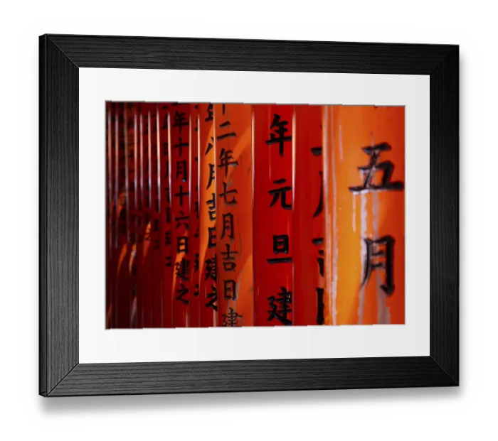 Framed Print : Kyoto, Japan, April 23 2025: Bright red torii gate standing closely together