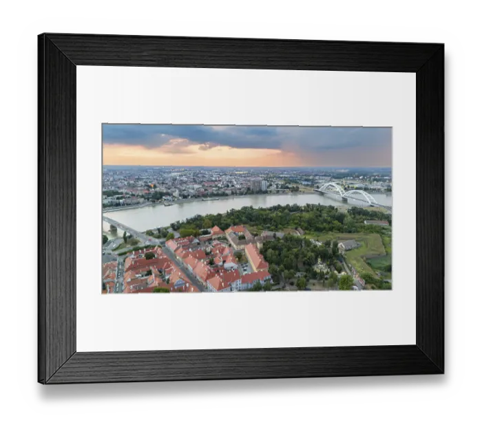 Framed Print : Scenic aerial view of Novi Sad Serbia featuring Petrovaradin fortress and Danube river at sunset Framed Print : Scenic aerial view of Novi Sad Serbia featuring Petrovaradin fortress and Danube river at sunset