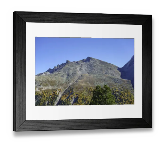 Framed Print : Rugged mountain landscape under blue sky