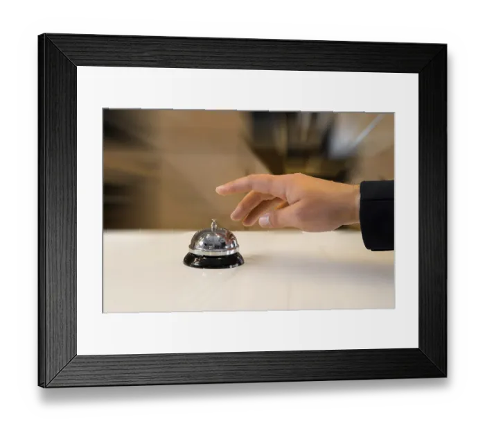 Framed Print : Hand of a man using a retro hotel bell Framed Print : Hand of a man using a retro hotel bell