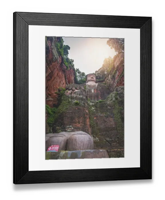 Framed Print : Leshan, China - July 2019 : The close up of the head and torso of the Giant Leshan Buddha