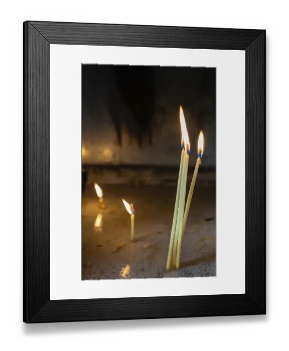 Framed Print : Row of burning memorial candles in the chapel of the orthodox monastery in Meteora