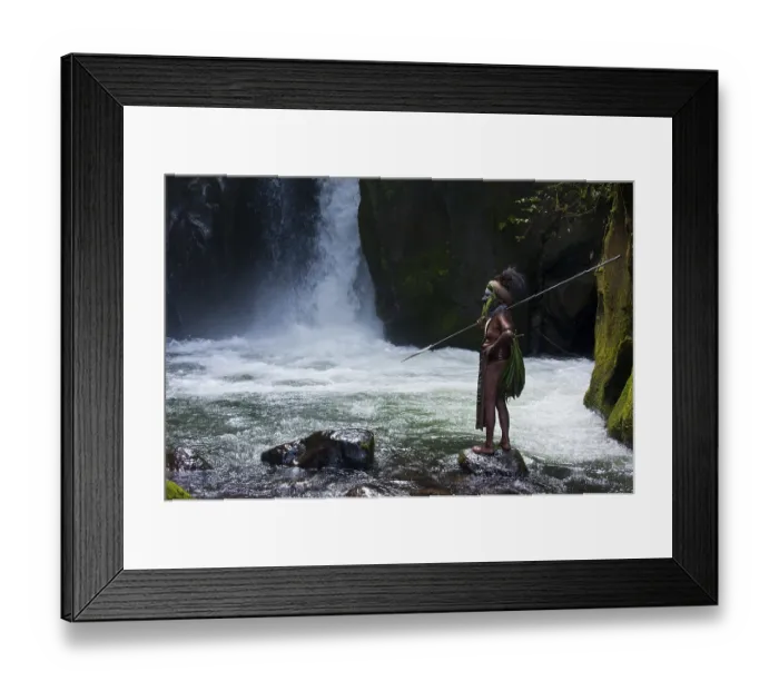 Framed Print : Decorated and painted tribal chief standing in front of a waterfall in the Highlands