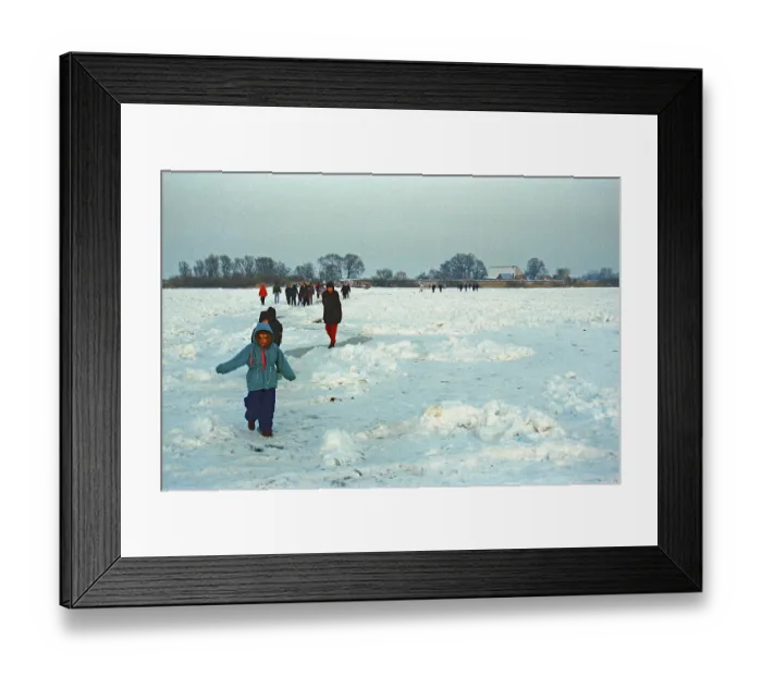 Framed Print : People walk across ice rink, frozen Elbe Framed Print : People walk across ice rink, frozen Elbe