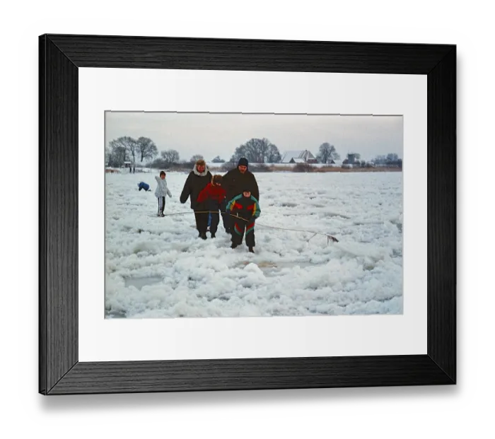 Framed Print : People walking across ice rink