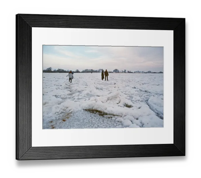 Framed Print : People walk across ice rink, frozen Elbe Framed Print : People walk across ice rink, frozen Elbe