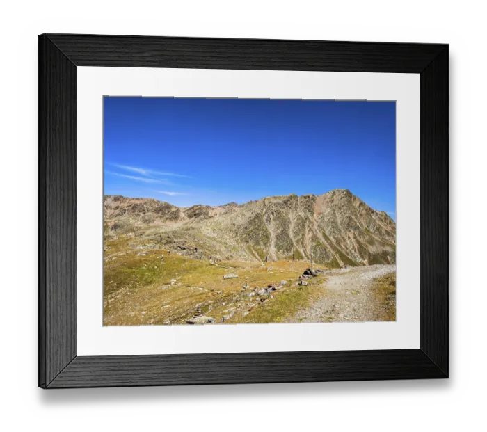 Framed Print : View of the high alpine mountain landscape at the Timmelsjoch rest house on the border between Austria and Italy