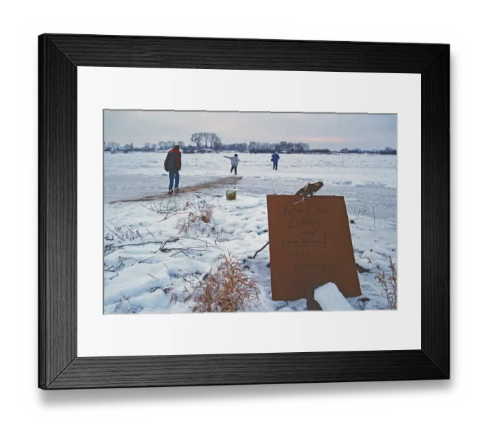 Framed Print : People walk across ice rink, ferry dock