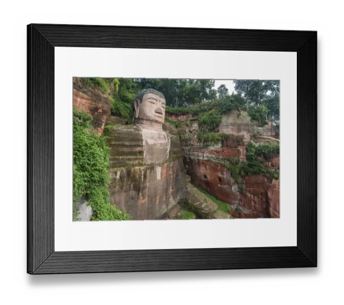Framed Print : Leshan, China - July 2019 : The close up of the head and torso of the Giant Leshan Buddha Framed Print : Leshan, China - July 2019 : The close up of the head and torso of the Giant Leshan Buddha