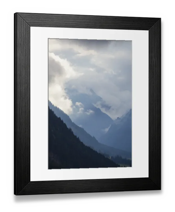Framed Print : Cloudy atmosphere with forest and mountains Framed Print : Cloudy atmosphere with forest and mountains