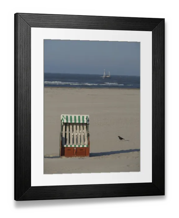 Framed Print : Beach chair on sandy beach with a bird Framed Print : Beach chair on sandy beach with a bird