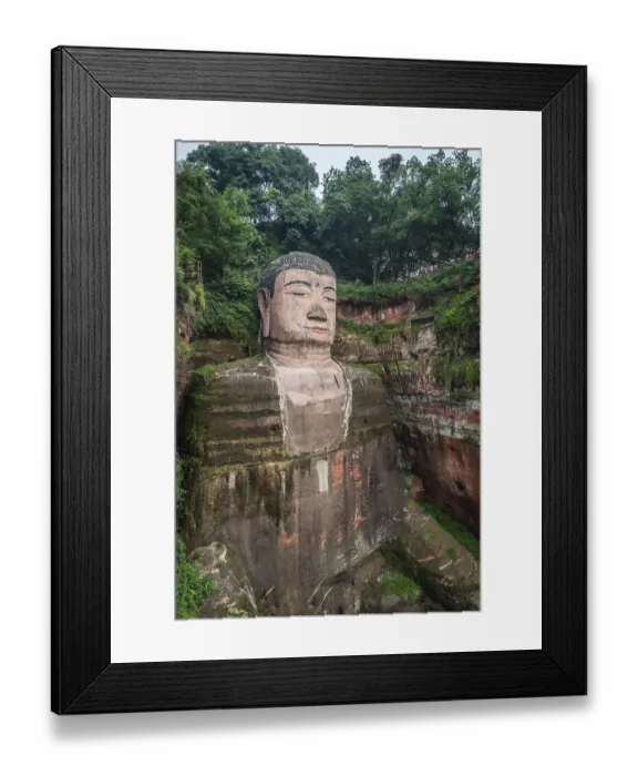 Framed Print : Leshan, China - July 2019 : The close up of the head and torso of the Giant Leshan Buddha