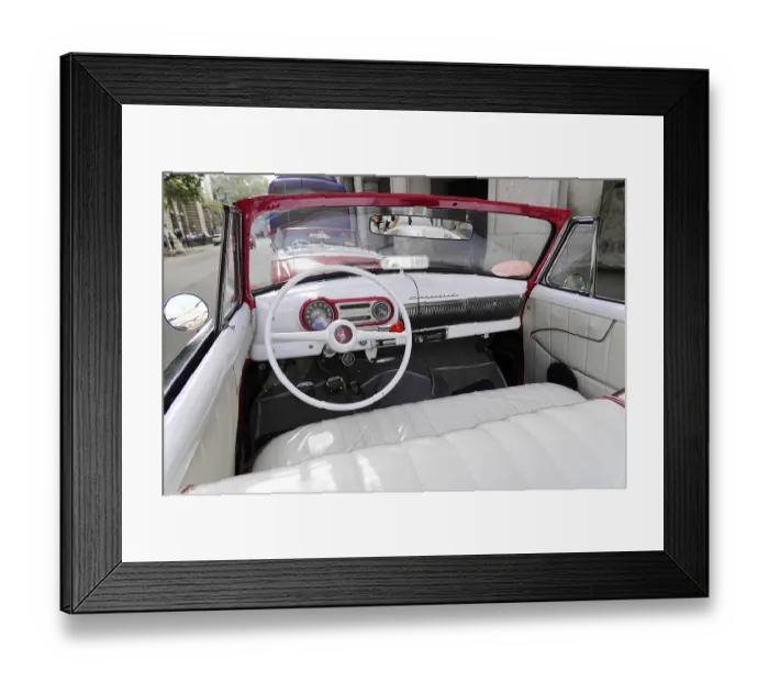 Framed Print : Interior of a vintage convertible with white leather and retro control panel