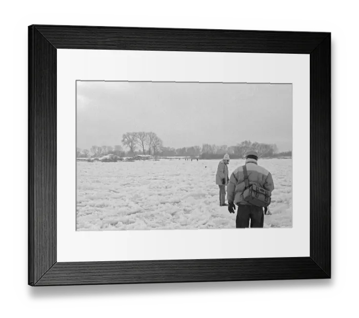 Framed Print : People walk across ice rink, frozen Elbe