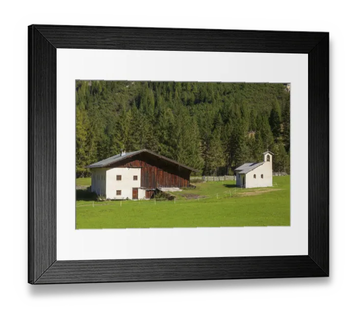 Framed Print : Farmhouses and chapel on the Issenangeralm in autumn