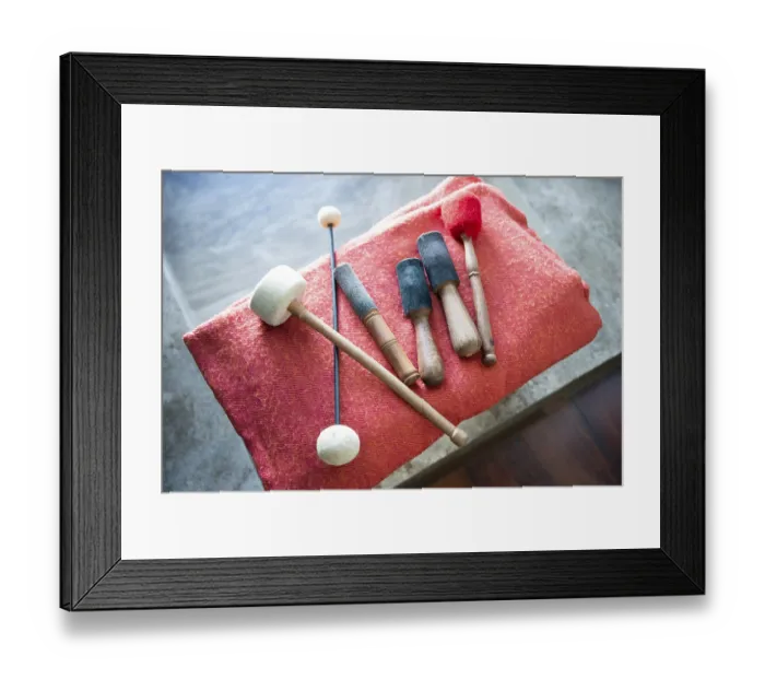Framed Print : Wooden sticks for sound therapy with singing bowls in spa salon Framed Print : Wooden sticks for sound therapy with singing bowls in spa salon
