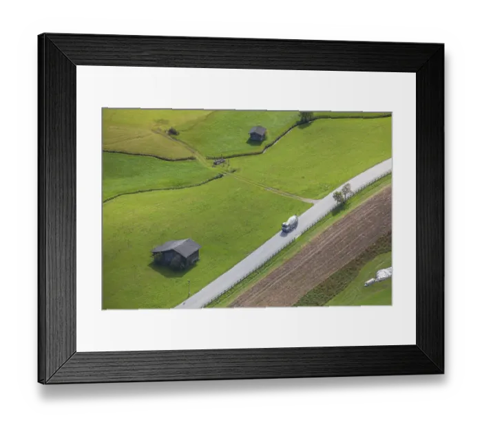 Framed Print : Alm with hay barn and country road