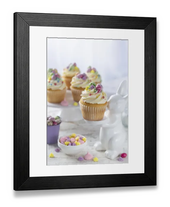 Framed Print : Food, Beautiful festive Easter cupcakes decorated with colorful sprinkles end candy eggs