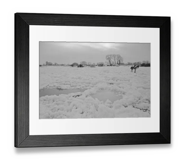 Framed Print : People walk across ice rink, frozen Elbe