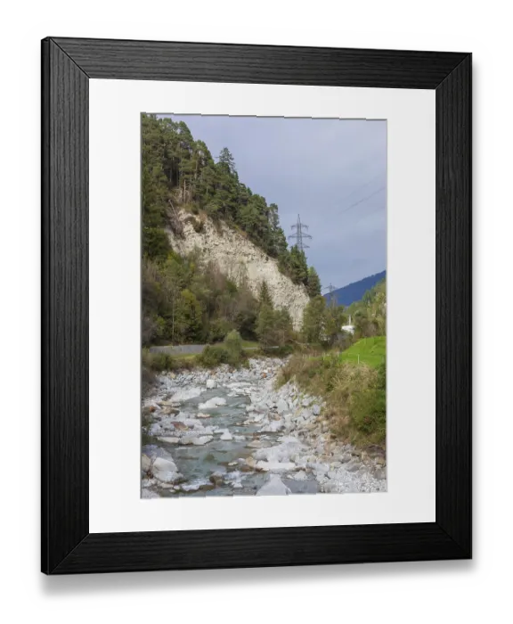 Framed Print : Rocks and high-voltage masts on the Ruetz river in the Stubai Valley between Telfes and Mieders Framed Print : Rocks and high-voltage masts on the Ruetz river in the Stubai Valley between Telfes and Mieders
