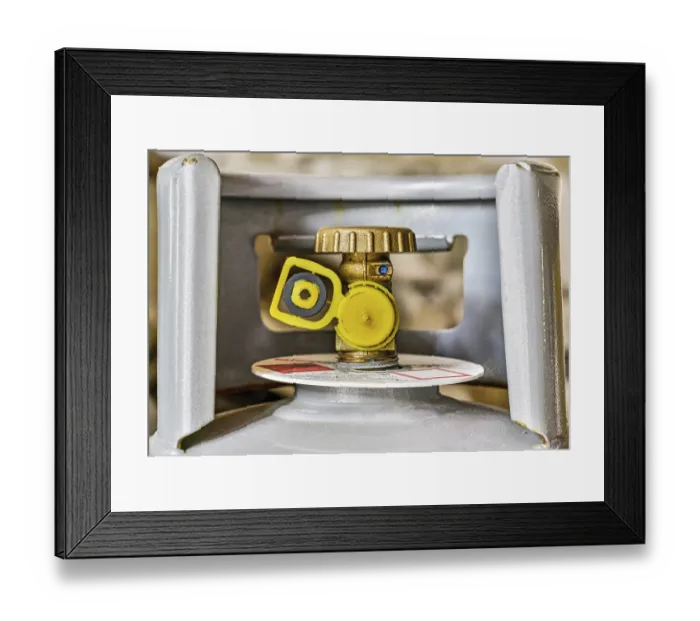 Framed Print : Gas tank valve with yellow cap and replacement gasket