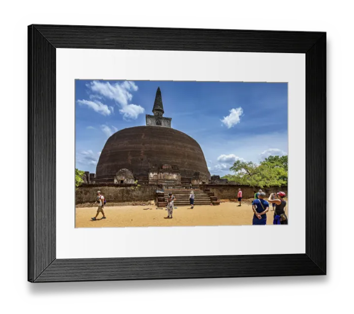 Framed Print : Large ancient stupa with people in the foreground on a sunny day Framed Print : Large ancient stupa with people in the foreground on a sunny day