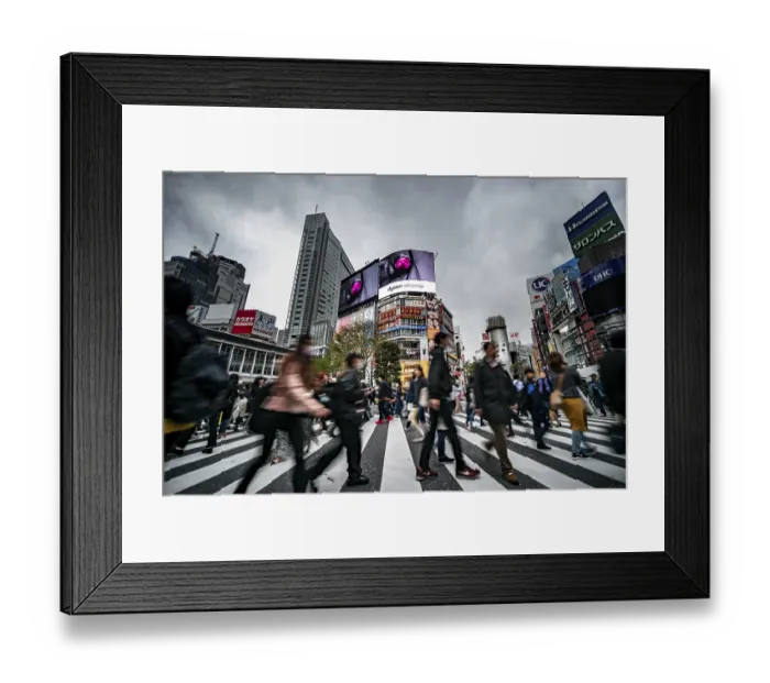 Framed Print : Crowd crossing zebra crossing on a large intersection Framed Print : Crowd crossing zebra crossing on a large intersection