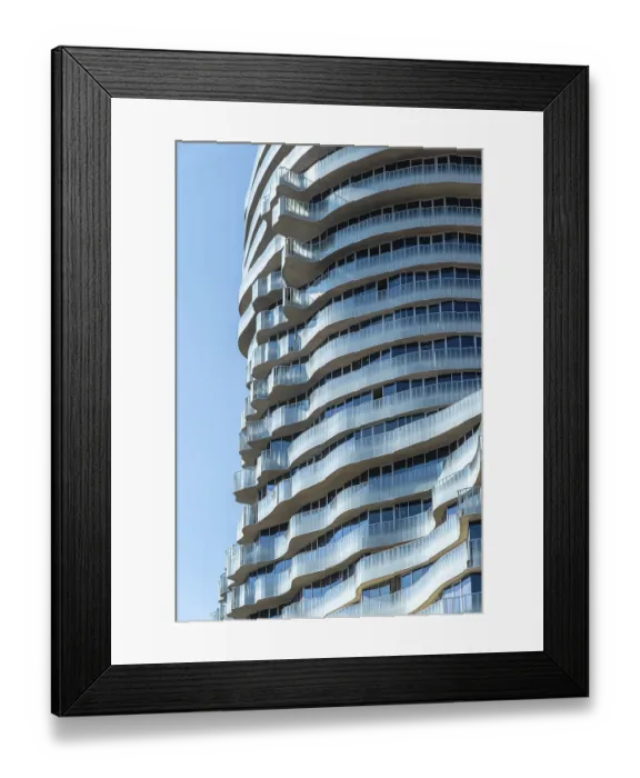 Framed Print : Detailed view of the curved balcony facade of a modern high-rise building Framed Print : Detailed view of the curved balcony facade of a modern high-rise building