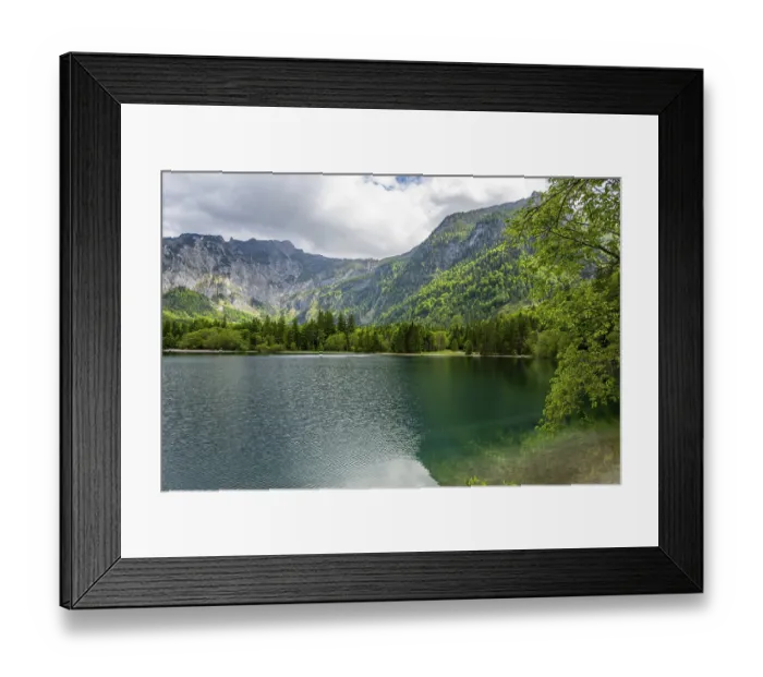 Framed Print : Landscape of Lake Offensee after rain when the sun comes through the clouds in spring