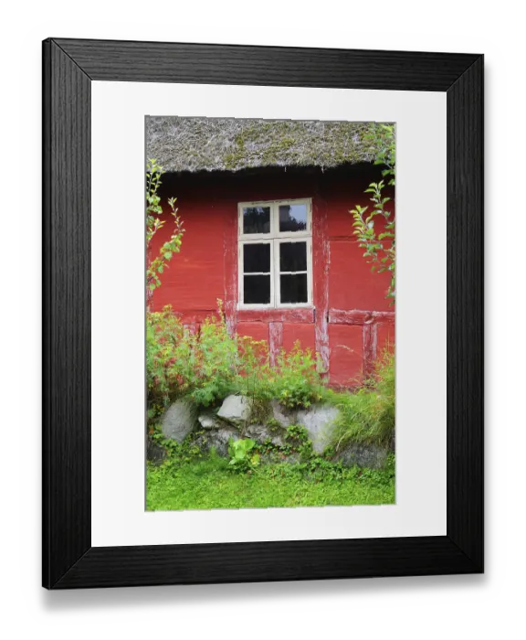 Framed Print : Window in red wall of half-timbered house with thatched roof in Den gamle by