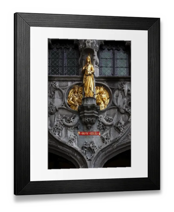 Framed Print : Golden figures on the richly decorated facade of the St
