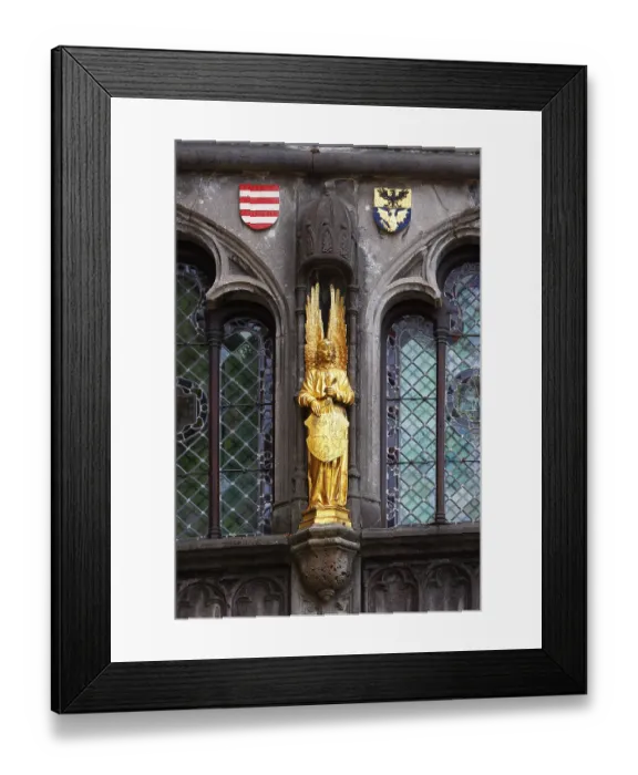 Framed Print : Golden Angel, figure on the facade of the St