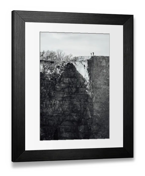 Framed Print : Couple taking picture on the edge of abyss in old quarry Kantyna in Poland
