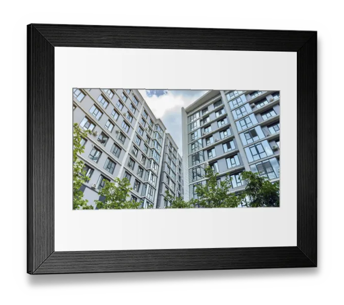 Framed Print : Modern high-rise residential buildings with reflective glass windows and air conditioners
